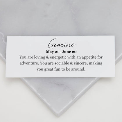 Gemini meaning card that reads: ‘ You are loving and energetic with anappetite for adventure. You are sociable and sincere, making you great fun to be around’.